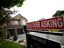 A real estate sign in front of a house in Vaughan on May 24, 2017.  